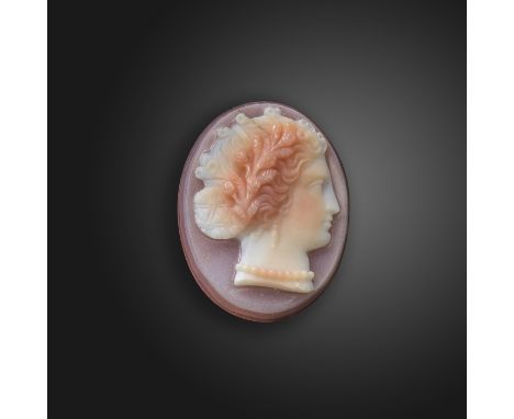 An early 19th century sardonyx cameo by Nicolo Morelli (1771-1838), depicting Flora or Venus in profile and wearing a pearl n