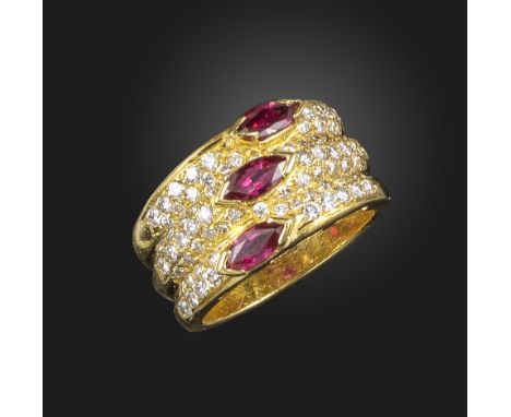 A ruby and diamond three-row ring, each row centred with a marquise-shaped ruby and pave-set to the shoulders with graduated 