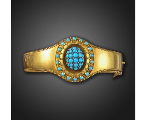 A Victorian turquoise and diamond bangle, the central raised oval dome pave-set with turquoise cabochons and rose-cut diamond