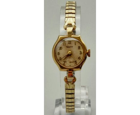 A Vintage 9K Gold Cased Rotary Ladies Watch. Expandable two-tone strap. 9k gold case - 21mm. Mechanical movement in working o