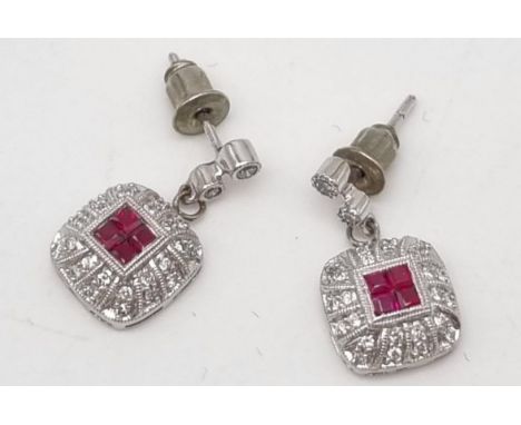 A Pair of 14K White Gold Ruby and Diamond Earrings.12 x 12mm. 4.5g 