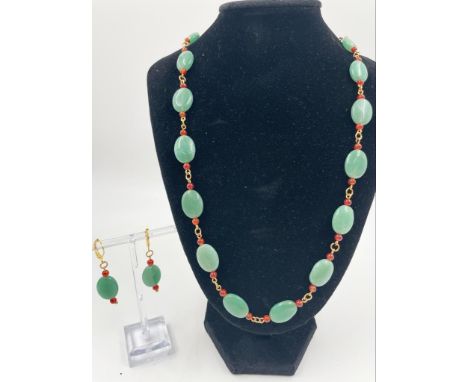 A Jade Bead Necklace and Earring Set. With carnelian spacers on a gold plated necklace. 44cm. Comes in a presentation case. 
