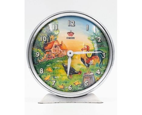 A Vintage Animated Hen and Rooster Alarm Clock. Hen pecks as the clock ticks. In working order. 