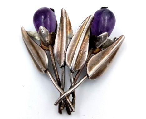 A Vintage and Amethyst Bouquet Brooch.4 x 4cm. 9.92g total weight. 