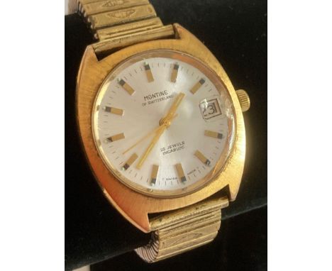 Gentlemans vintage 1970s MONTINE  wristwatch, manual winding model in perfect working order,Having gold tone case with metal 
