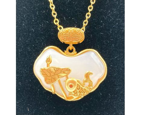 A White Jade Pendant with 24k Gold Plated Fish Decoration - On an 18k gold plated necklace. Base metal 925 silver. 40cm and 2