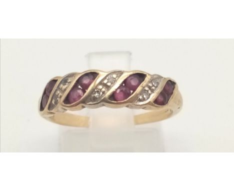 9K YELLOW GOLG DIAMOND &amp; RUBY BAND RING. SIZE N. TOTAL WEIGHT 2 GRAMS 
