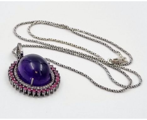 37.70cts Cabochon Amethyst Gemstone Pendant with 2cts Rubiesand .70cent Diamonds in halo setting in 925 Silver, black finish,