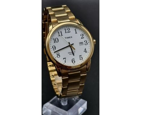 A Gold Plated Timex Indiglo Watch. Gold plated strap and case - 38mm. Quartz Movement.In working order. As new, in original b
