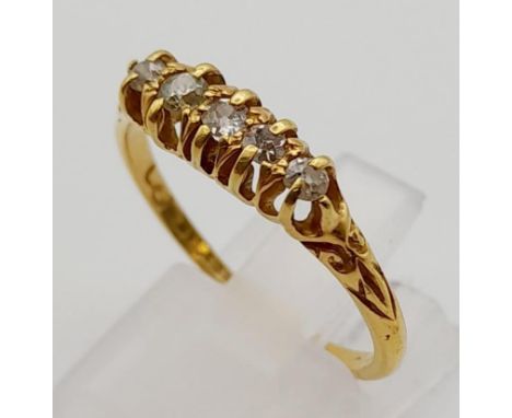 An 18K Yellow Gold Five Stone Diamond Ring. Size R.2.5g 
