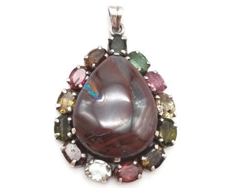 A 925 Silver Tourmaline and Opal Centre Stone Pendant.Opal - 43.45ct. T - 10.79ct. 4cm. 19.15g total weight. 