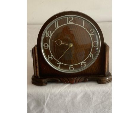 Vintage SMITHS  wooden mantle clock,wind up model in full working order.Having numbers and hands in art deco form. Mostly exc