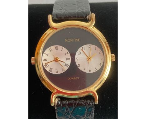 Rare and unusual  MONTINE Quartz double dial wristwatch. Black face with gold tone surround. Full working order. Quality blac