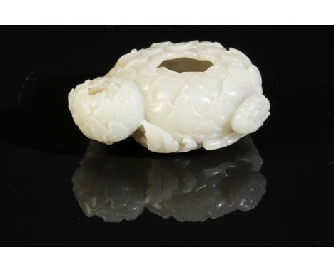 A CHINESE CELADON JADE DOUBLE BRUSH-WASHER finely carved as two lotus flowers with numerous petals, with a soft lustrous poli