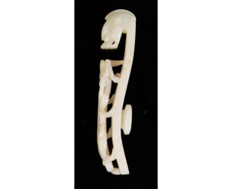 A CHINESE WHITE JADE BELT HOOK carved in openwork and undercut with a chilong crawling towards the dragonhead hook, with a ci