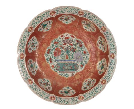 A MASSIVE CHINESE FAMILLE VERTE BASIN enamelled in polychrome with shaped panels of birds surrounding a jardiniere of flowers