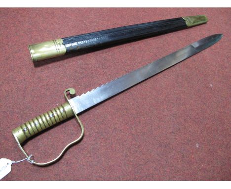 A Victorian Sawback Pioneer Short Sword, 22½ inch blade stamped with WD Arrow, Royal Cyphers by Wilkinson Sword, brass grip a