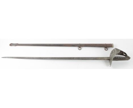 Sword Victorian 1895 pattern Infantry Officers sword with engraved blade in its metal scabbard.