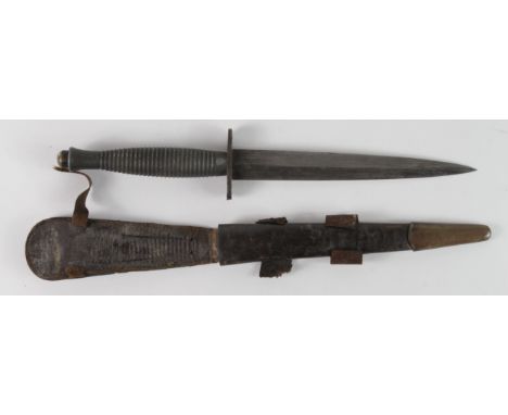 WW2 3rd Pattern, Fairbairn Sykes Commando Knife. Ribbed hilt, blade 17.5cm. Pommel marked '3'. No other markings. In its bras