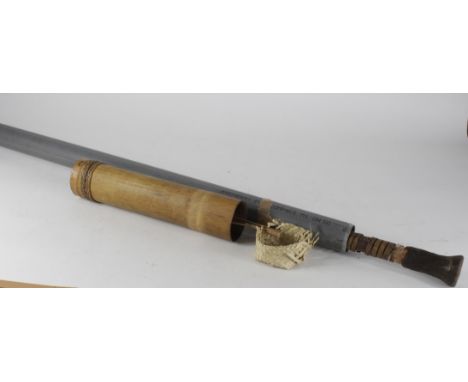 Malaysian tribal blow pipe with bamboo sheath containing 3x darts.  Fragile  (74 inches long)    Buyer collects
