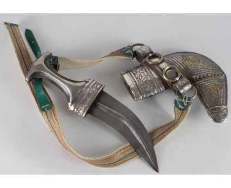 Omani khanjar (dagger) with attractive silver and gold decorated scabbard, horn handle (chips to handle noted). 