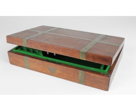 Brass bound, oak (?) box for an automatic pistol or revolver. Lined in green baize. A nicely made box 24cm x 15cm, with inter