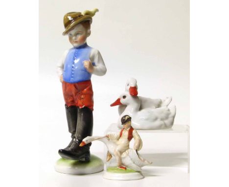 Herend figure of a boy, a boy riding a goose and a pair of geese. No condition reports for this sale.