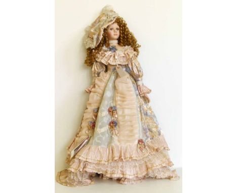 Large scale doll complete with traditional clothes. No condition reports for this sale.