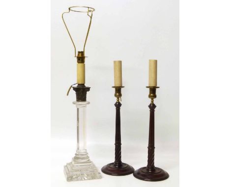 Pair of mahogany table lamps and a cut glass reading lamp. No condition reports for this sale.