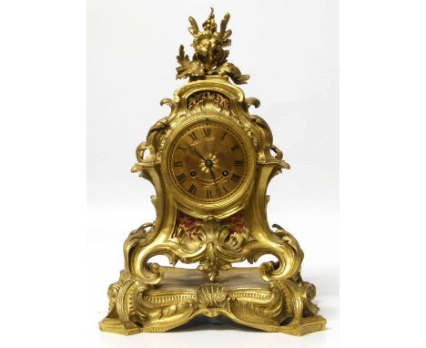 Victorian gilt metal 8-day mantel clock, stampled to movement Raingo, Paris. No condition reports for this sale.