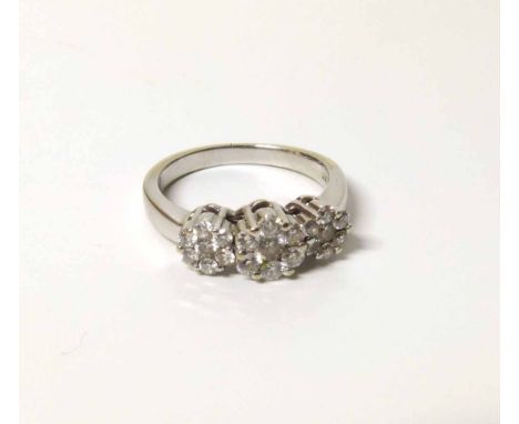 Diamond triple cluster 14ct white gold ring, total diamond weight of approximately 1ct. No condition reports for this sale.