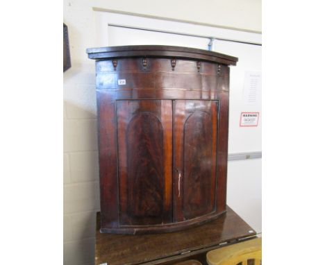 Georgian mahogany bow front corner cupboard