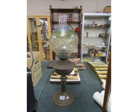 Victorian brass oil lamp with globe