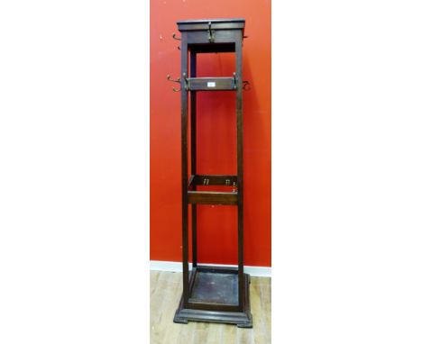 An Edwardian mahogany coat and stick stand, 55 x 181cm