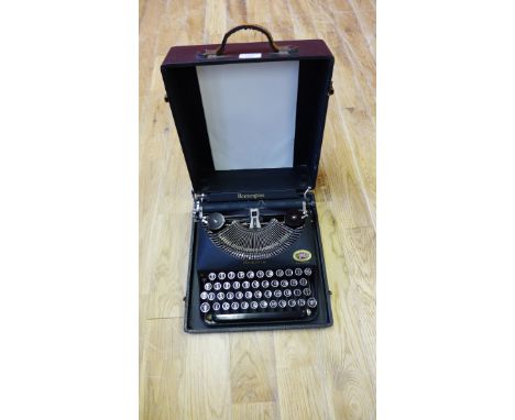A Remette typewriter in fitted case 