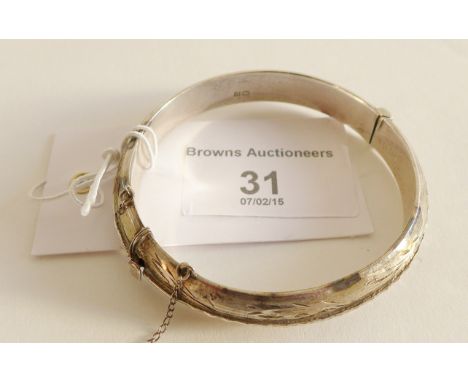 A Birmingham silver stiff hinged bangle 