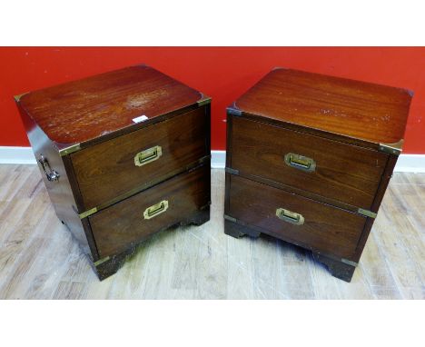 A pair of reproduction oak brass bound chest of drawers with two short drawers raised on bracket feet, 47 x 50cm (2) 