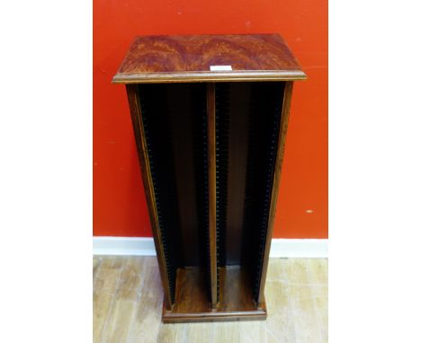 A contemporary hardwood CD rack, 36 x 88cm  