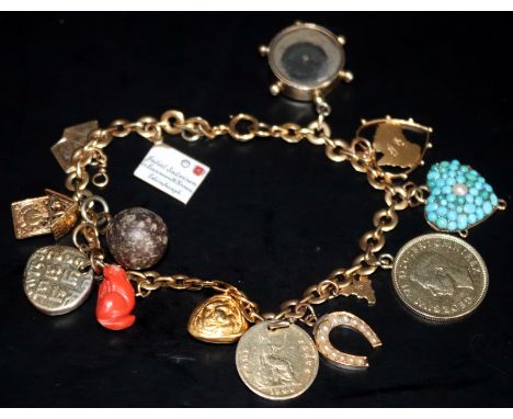 9ct Gold Charm Bracelet With 14 Charms, Some 14ct, To Include Enamel Envelope, Compass, Coins, Horse Shoe With Seed Pearls, T