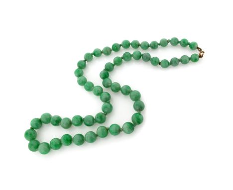 A single row jade bead necklace, the beads graduate from 6.6 to 9.8mm.