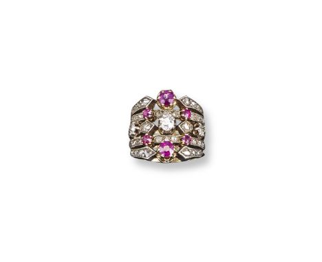 An Edwardian diamond and ruby-set harem ring, the five bands are each set with rubies and diamonds in platinum and gold. Size