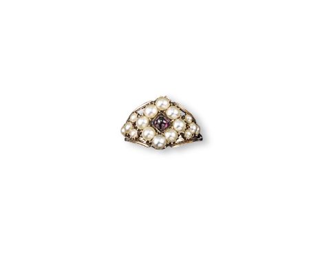 A Victorian pearl and garnet cluster ring, the sugarloaf garnet is set within a surround of seed pearls in gold. Closed back 