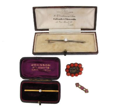 A diamond set gold bar brooch, in fitted case, a ruby and diamond half hoop ring, a George III coral set mourning brooch and 