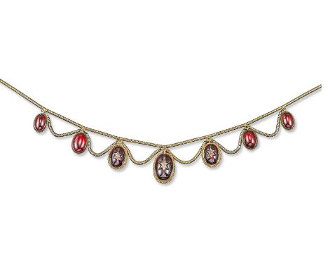 A Victorian garnet set gold festoon necklace, the snake link chain suspending a line of graduated cabochon garnets with inter
