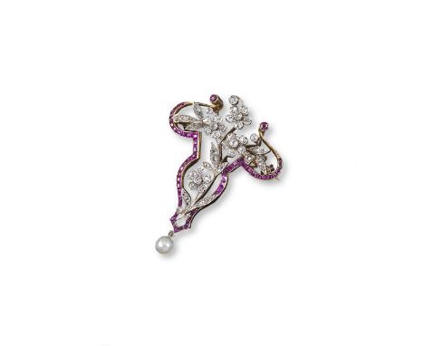An Edwardian ruby and diamond foliate brooch, the diamond set flowers are set within a calibre cut ruby surround and suspendi