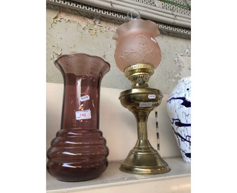 A parafin lamp brass and a glass vase 