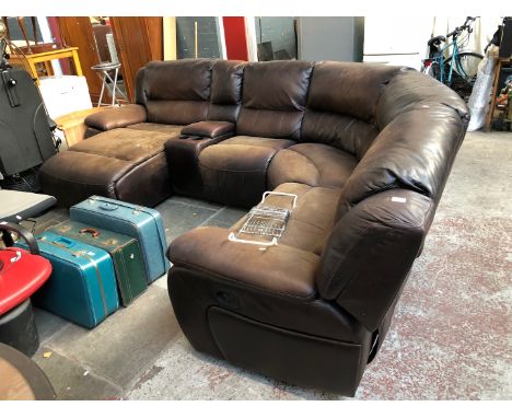 A leather corner sofa ( 1 recliner doesn't work ) 