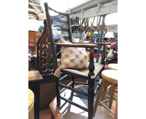 A Billinge ladder back and rush seated chair. 