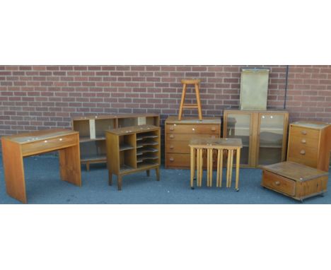 A teak Stagg dressing table; a teak folding nest of tables; a teak bookcase; an oak bookcase; a pine stool; a Lloyd Loom styl