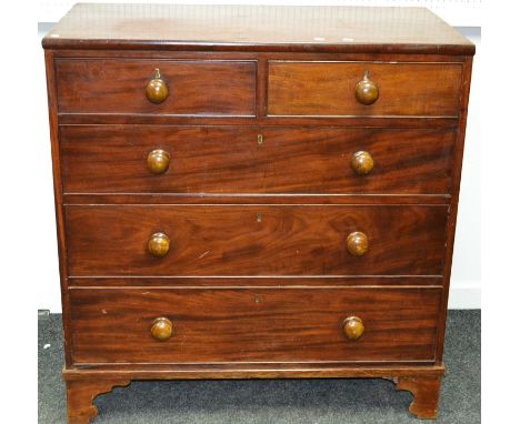 A  Victorian mahogany chest of two short cockbeaded drawers over three graduated long, button handles. 107cm high x 104cm wid